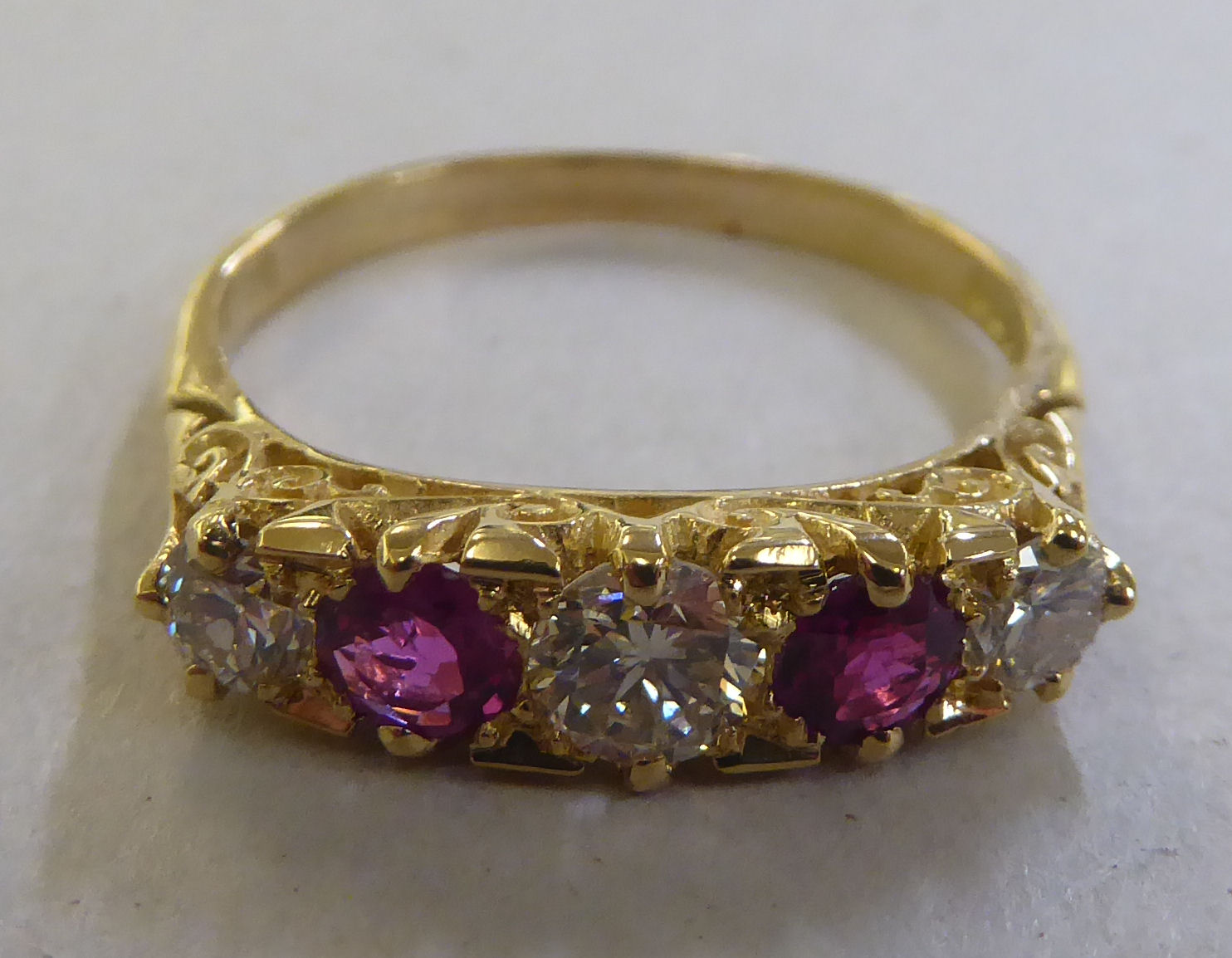 An 18ct gold diamond and ruby ring