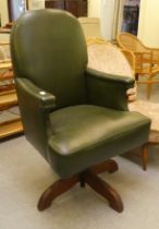 A mid 20thC faux green hide upholstered swivel office chair, raised on a splayed pedestal base