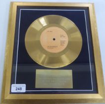 A presentation Gold 45rpm disc, awarded to Brian Connolly for 1,000,000 world wide sales of The