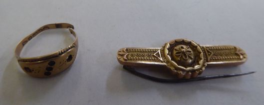 A 9ct gold bar brooch; and a 9ct gold ring