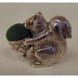 A silver novelty pin cushion, fashioned as a squirrel  stamped Sterling