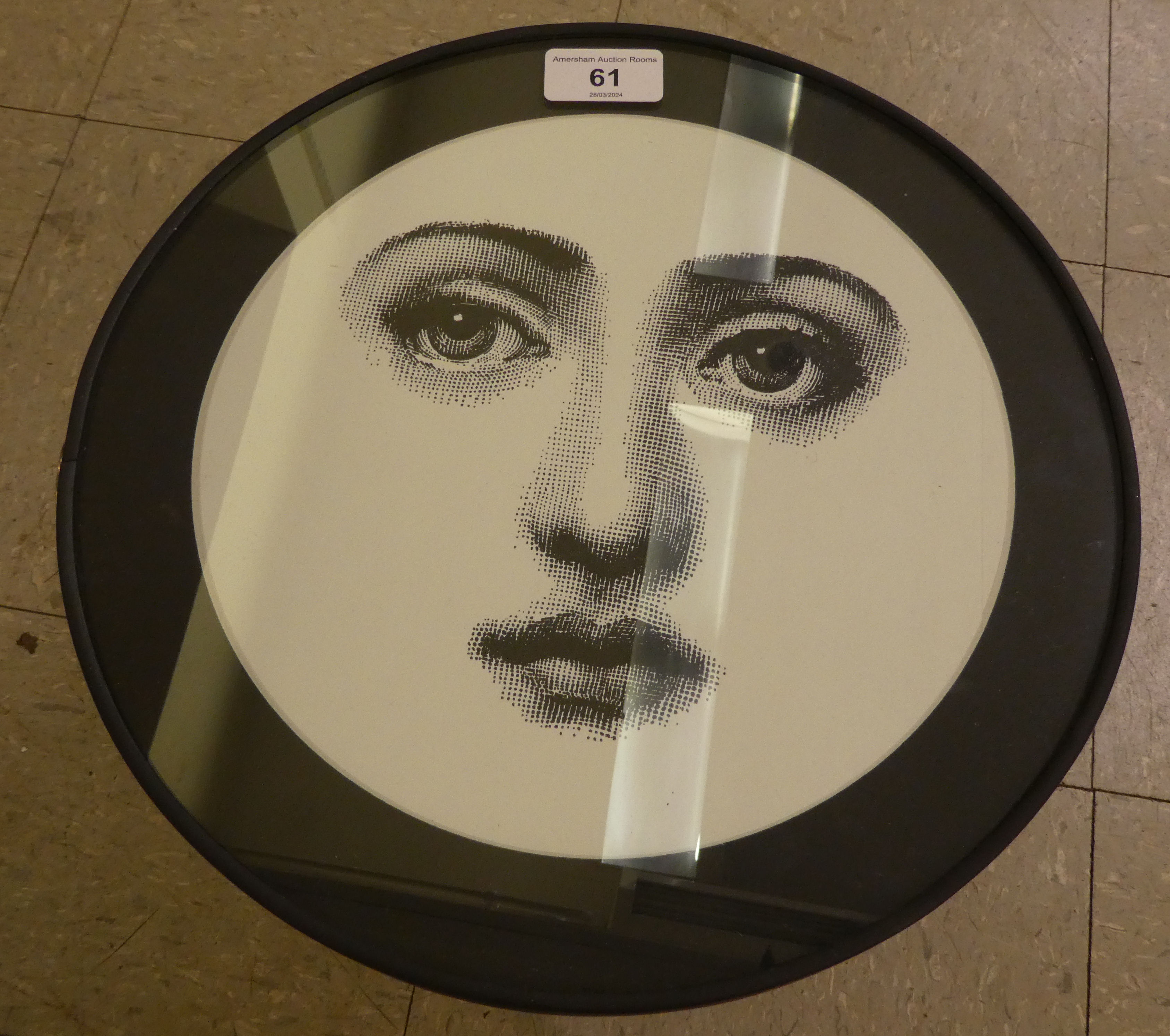 A modern Cole & Son table stool from the Fornasetti Collection from designs by Piero Fornasetti