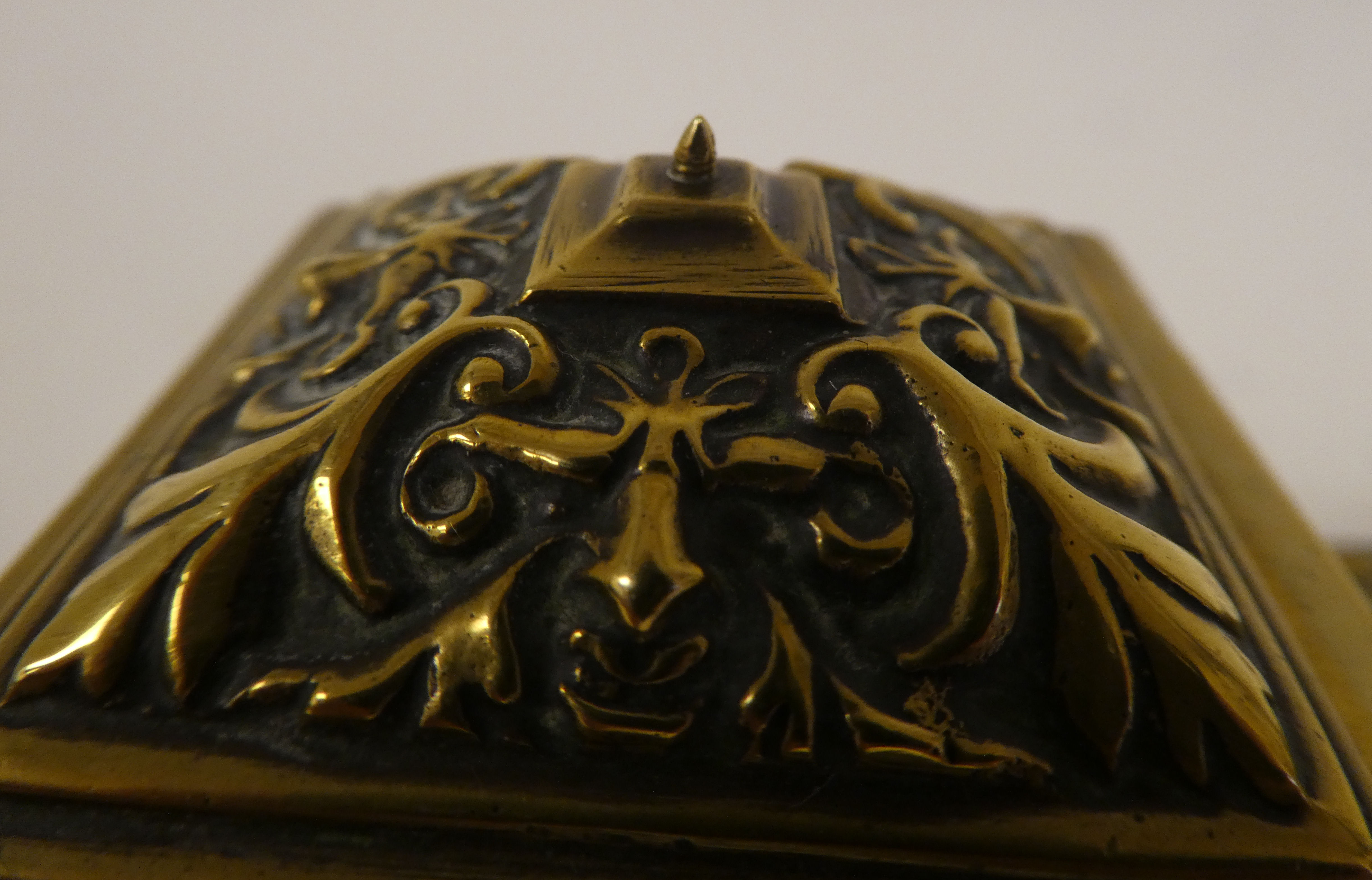 Six variously designed, early/mid 20thC decoratively cast brass desktop lidded inkwells - Image 3 of 4