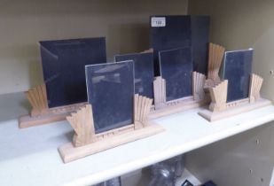 Five similar Art Deco style, carved and framed photograph display stands  largest 8" x 11.5"