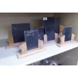 Five similar Art Deco style, carved and framed photograph display stands  largest 8" x 11.5"