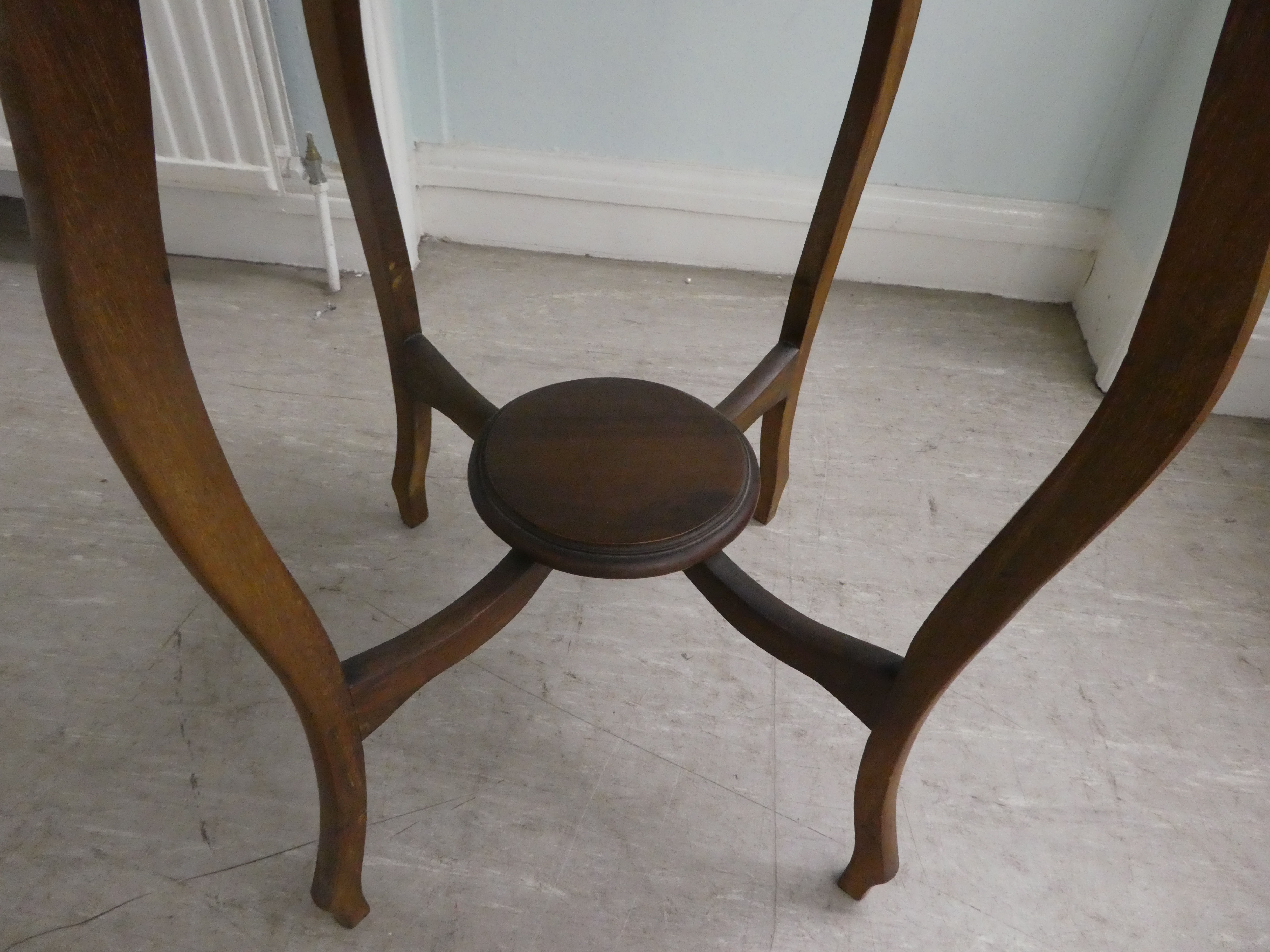 A mid 20thC mahogany occasional table, having a serpentine outlined top, raised on cabriole legs, - Image 3 of 3