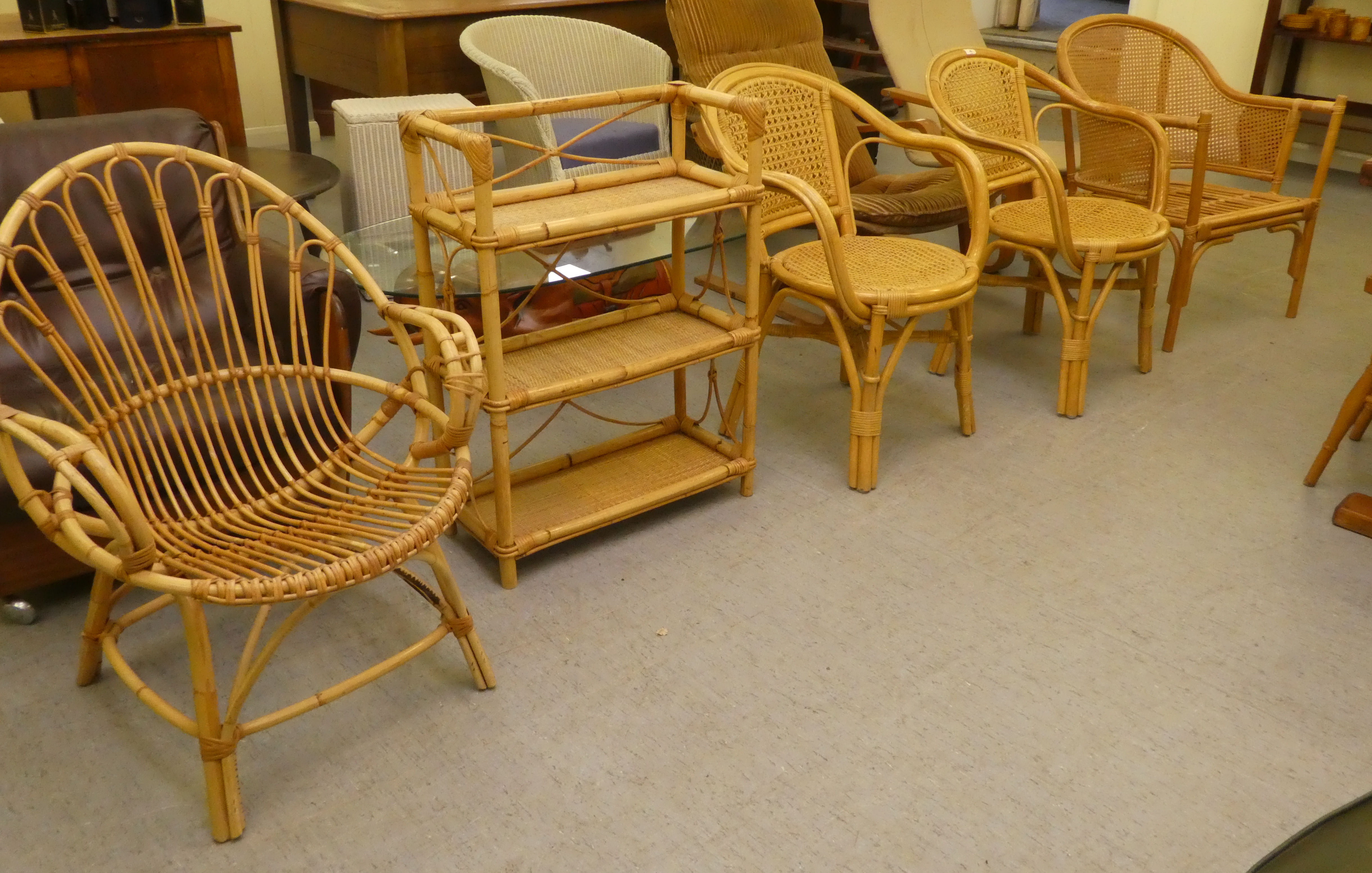 1960s light coloured bamboo and woven split cane conservatory furniture, viz. a pair of open arm,