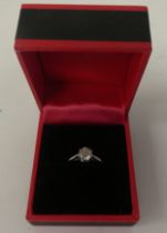 An 18ct white gold, claw set, diamond solitaire ring