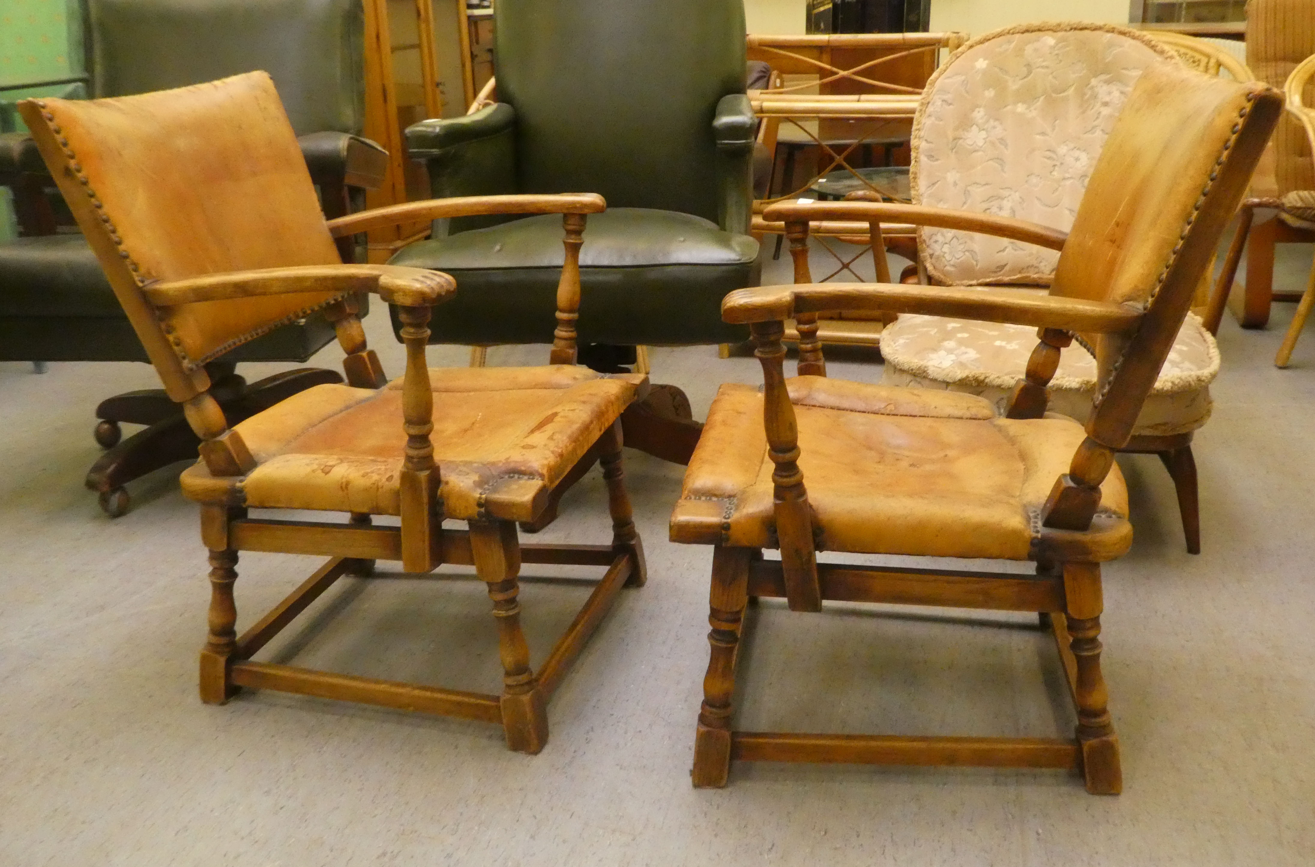 A pair of 1930w oak framed chairs with brown hide upholstered backs and seats, raised on block legs - Image 3 of 5