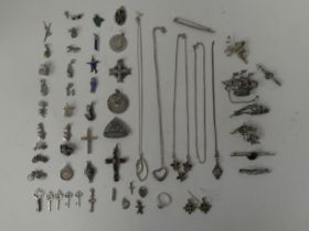 Silver, silver coloured and white metal items of personal ornament: to include brooches; pendants;