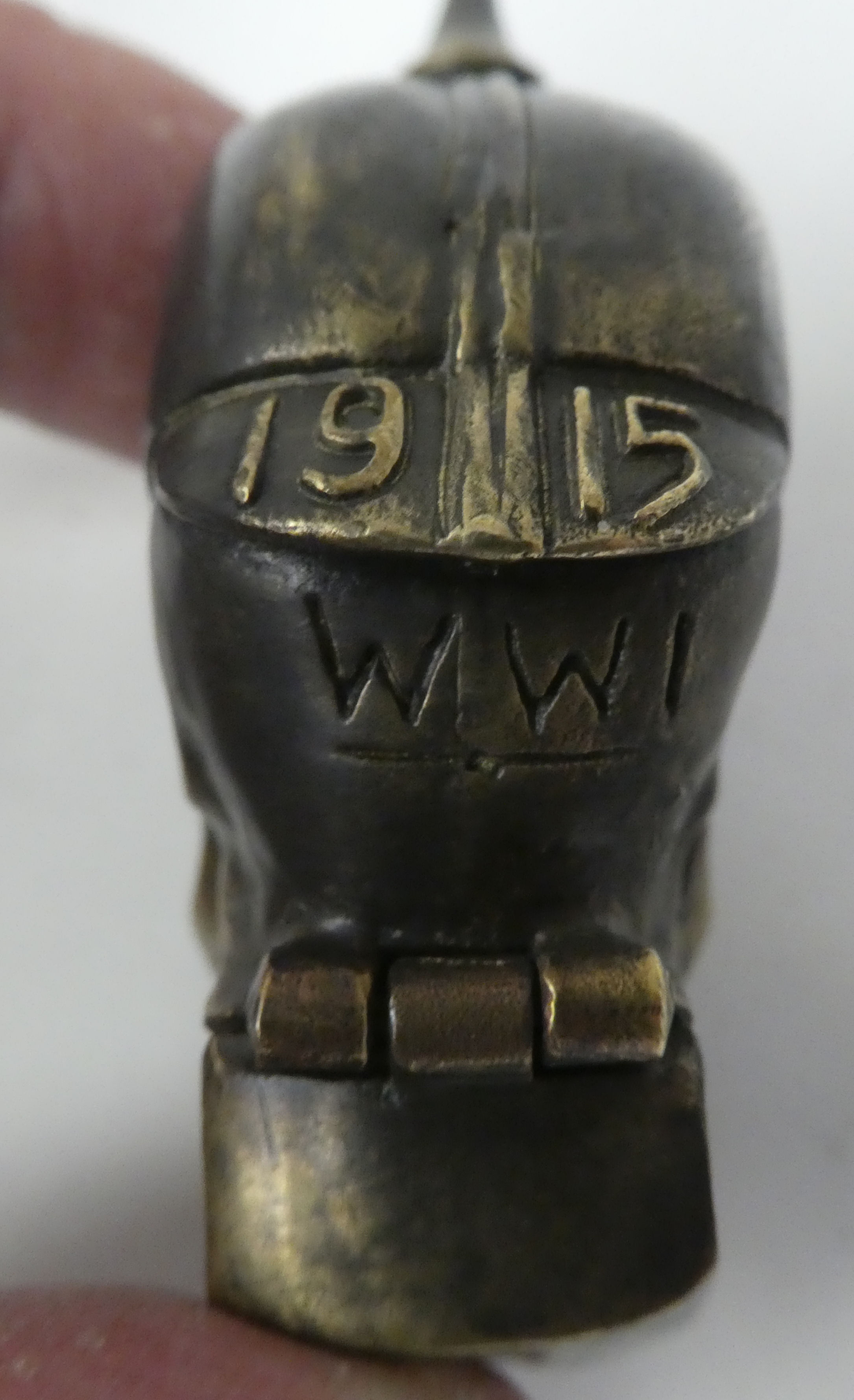 A brass vesta case, fashioned as a skull wearing a pickelhaube - Image 4 of 5