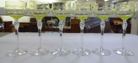 A set of Art Nouveau light green shaded pedestal wine glasses  7.5"h