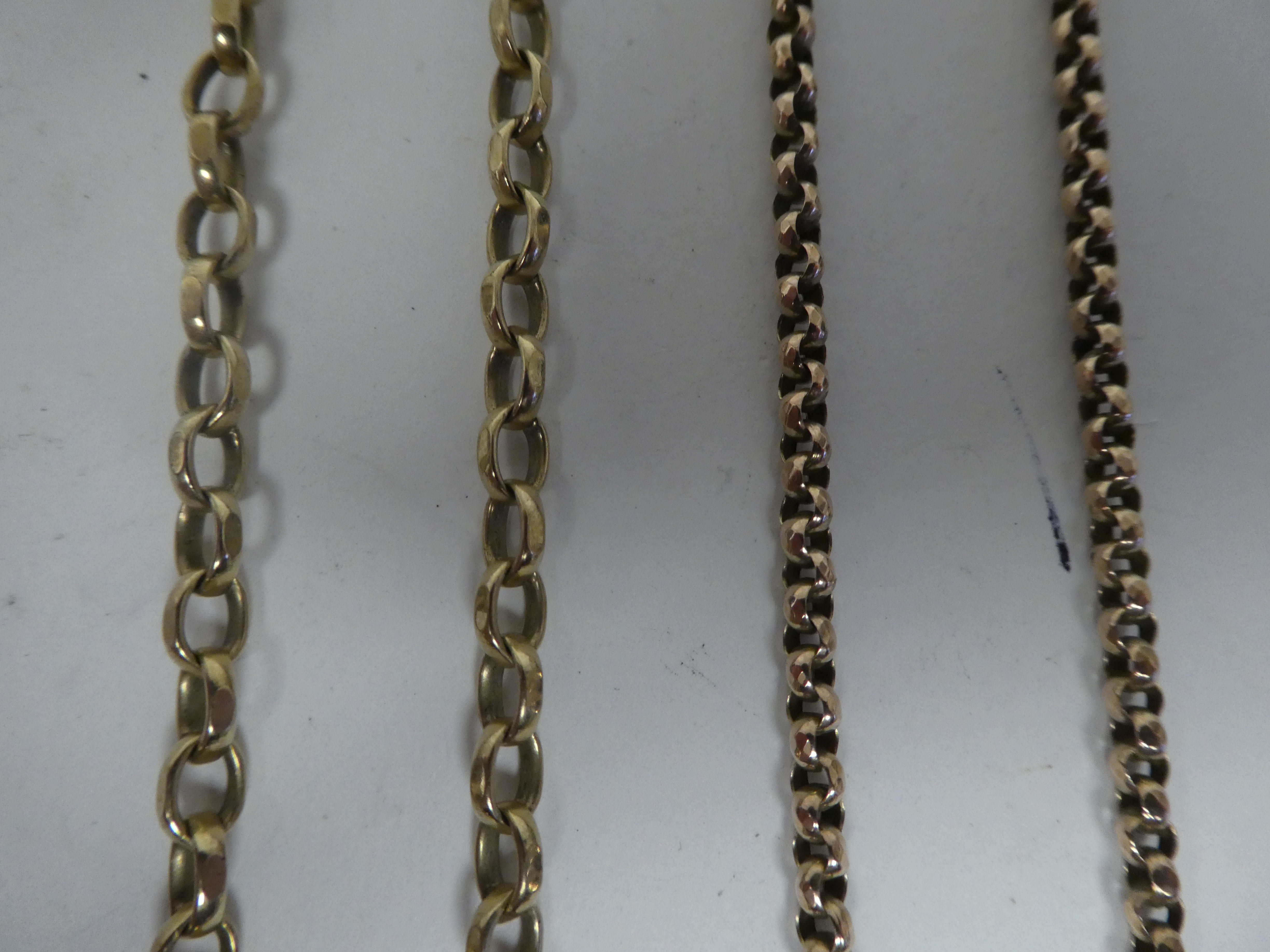 A gold coloured metal chiselled belcher link necklace, on a dog clip clasp; and another, on a - Image 2 of 2