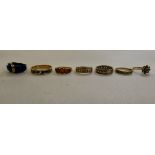 Seven various gold coloured metal and other, variously set dress rings