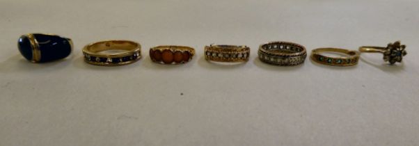 Seven various gold coloured metal and other, variously set dress rings