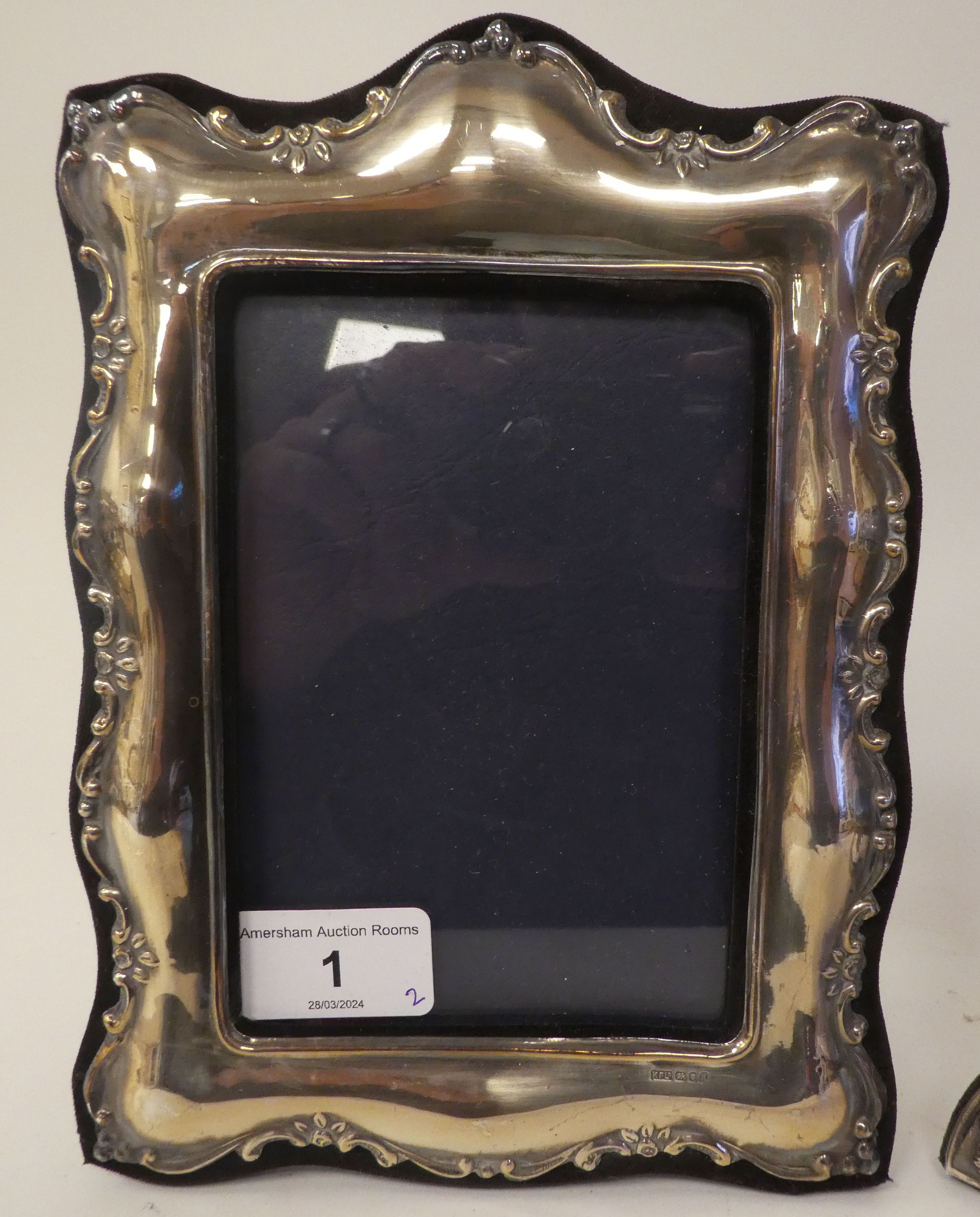 Two dissimilar, glazed, silver mounted photograph frames with embossed ornament, fabric backs and - Image 2 of 6