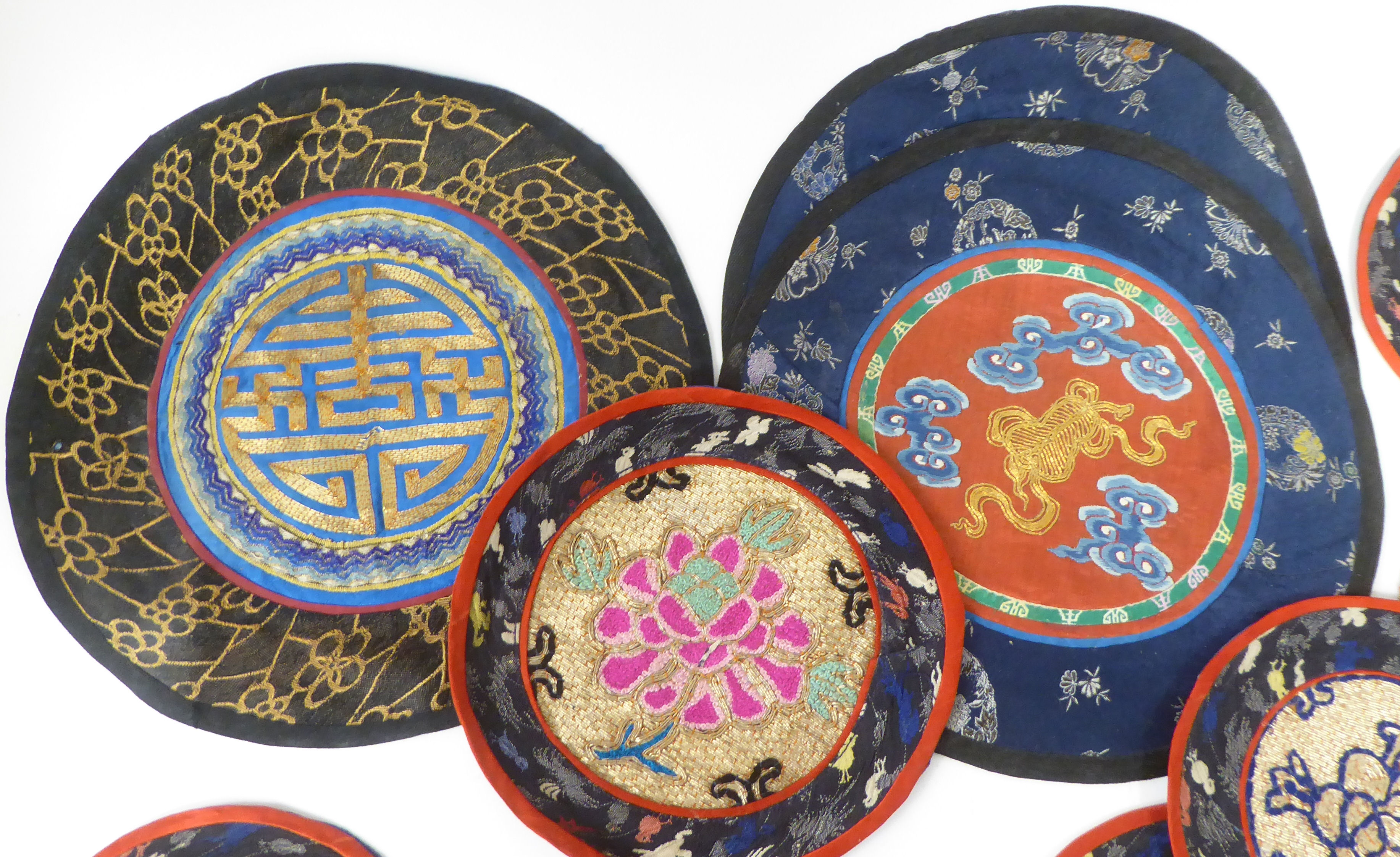 Approx. thirty 20thC Chinese fabric roundel table mats, embroidered in coloured silk and yellow - Image 2 of 5