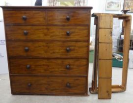 A late Victorian mahogany six drawer dressing chest, on a plinth  48"h  42"w
