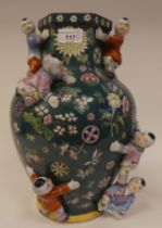 A 20thC Japanese porcelain vase, decorated with flowers and relief with children climbing  14"h