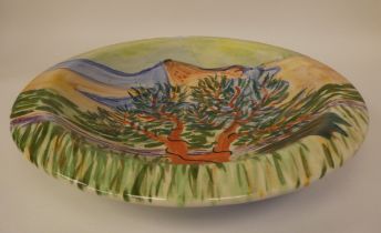 A 1991 Royal Academy of Arts pottery shallow dish, decorated in colours by Suzanne Katkhuda with a