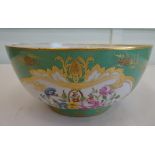 A Rockingham Works porcelain fruit bowl, decorated with flora and gilding  10"dia