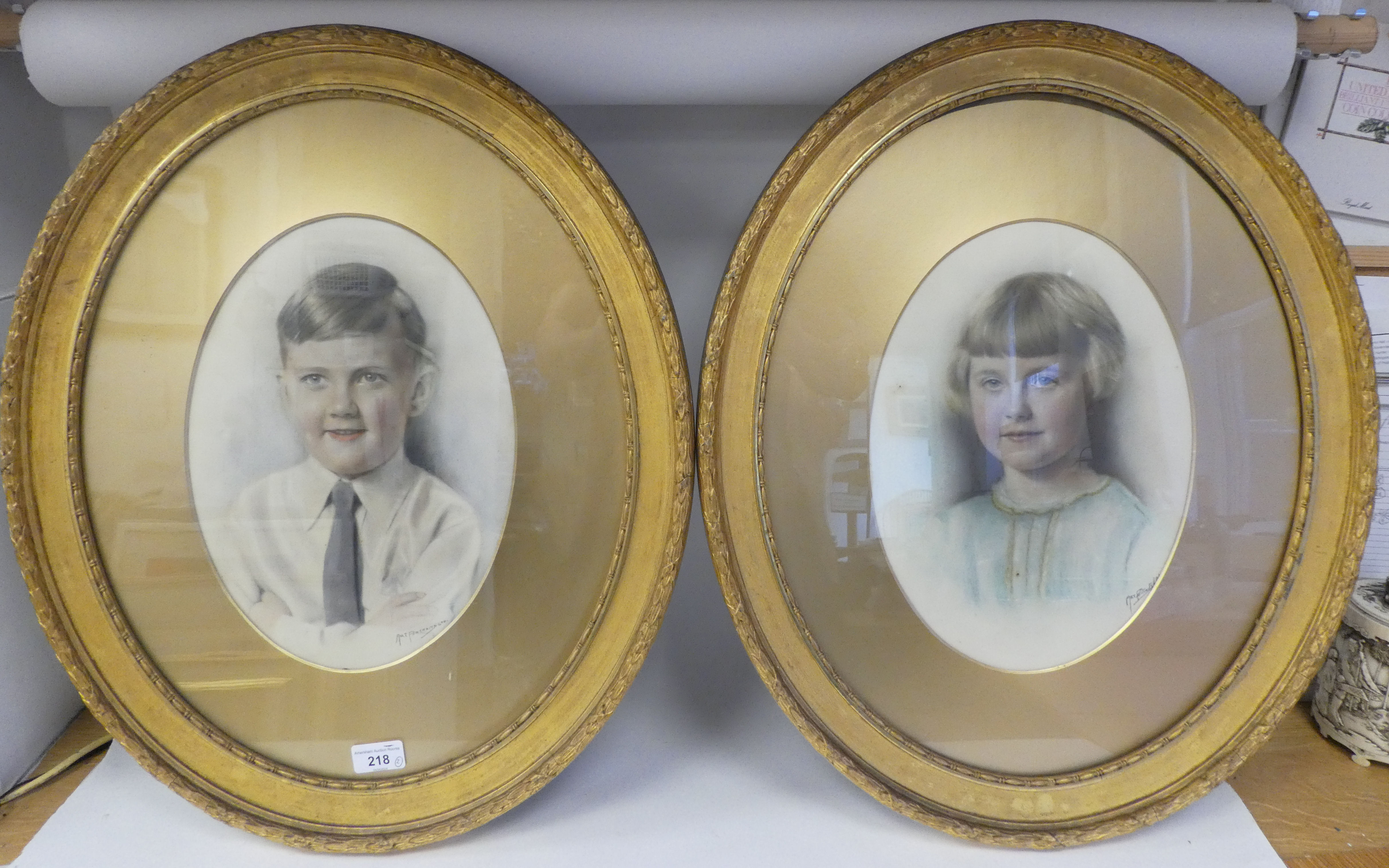 Two framed Art Portrait Ltd head and shoulders portraits, a brother and sister  watercolours  13"