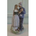 A Royal Copenhagen porcelain group, a courting couple, model no.3049  17"h