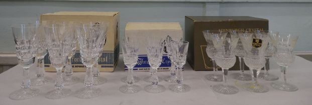 Two sets of six Waterford crystal sherry glasses; and another six by Edinburgh Crystal