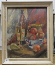 E Eardley - a still life study, mixed items on a table  oil on board  bears a signature  19" x