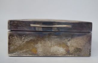 A silver cigarette box with straight sides, a hinged lid and cedar lined interior  London marks
