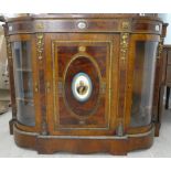 A mid Victorian string inlaid burr walnut and quarter veneered credenza, the bow and breakfront