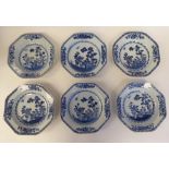 A set of six 18thC Chinese porcelain dishes of hexagonal outline, decorated in blue and white with