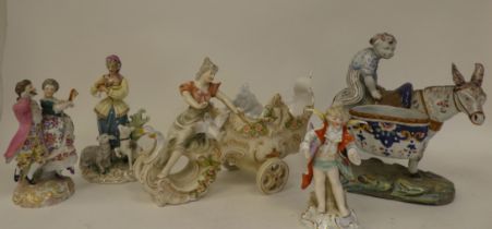 20thC Continental ceramic figures: to include a boy riding a donkey with two panniers  9"h