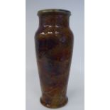 An early 20thC Royal Doulton stoneware vase of slender, waisted baluster form with an upstand rim,