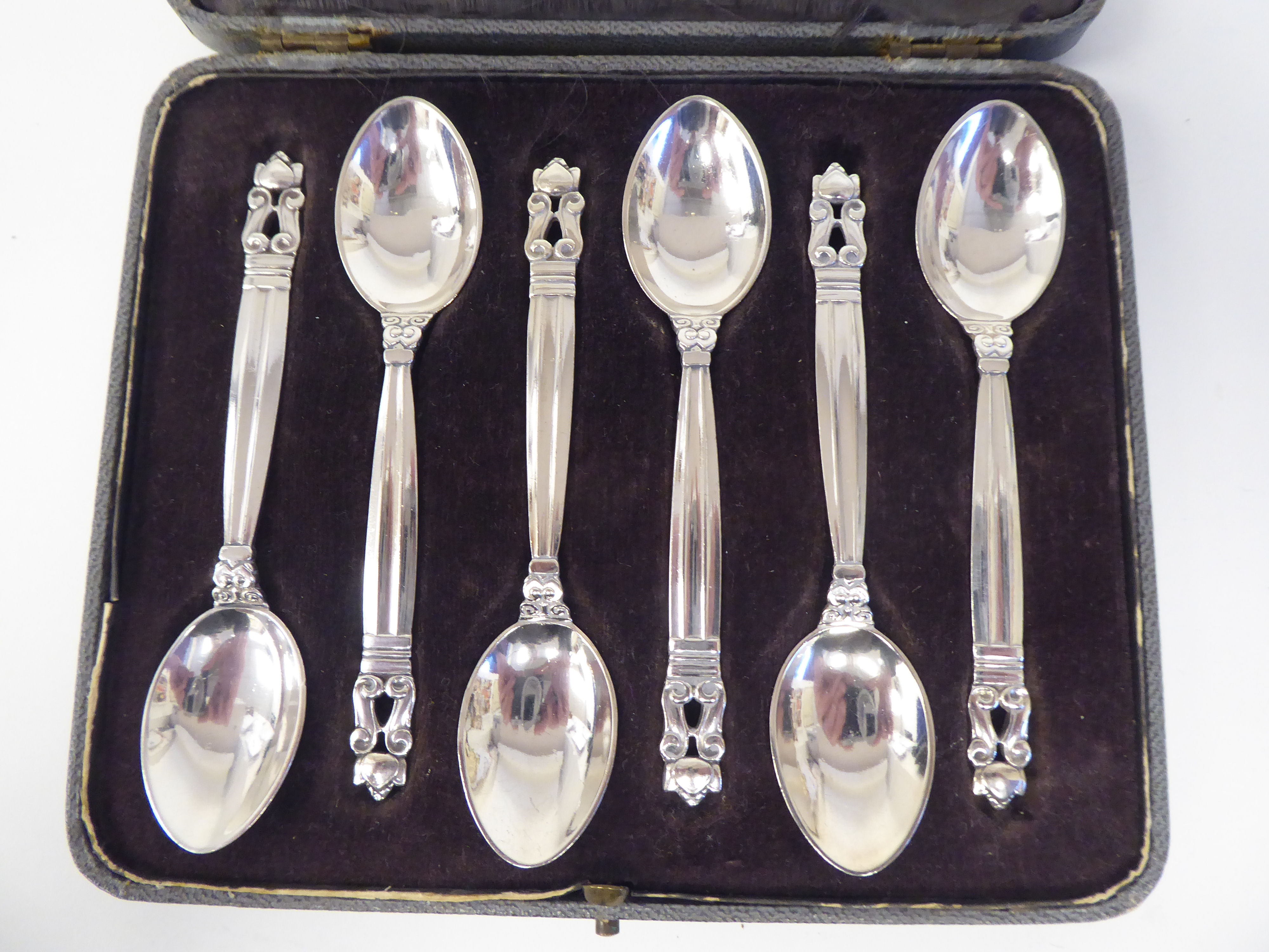 A set of six Georg Jensen silver teaspoons with scrolled terminals  stamped 925  cased - Image 3 of 4