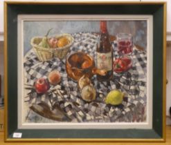 E Eardley - a still life study, mixed items on a table  oil on board  bears a signature  19" x