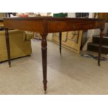 A late Victorian mahogany library table with a tooled and gilded hide scriber, over an arrangement