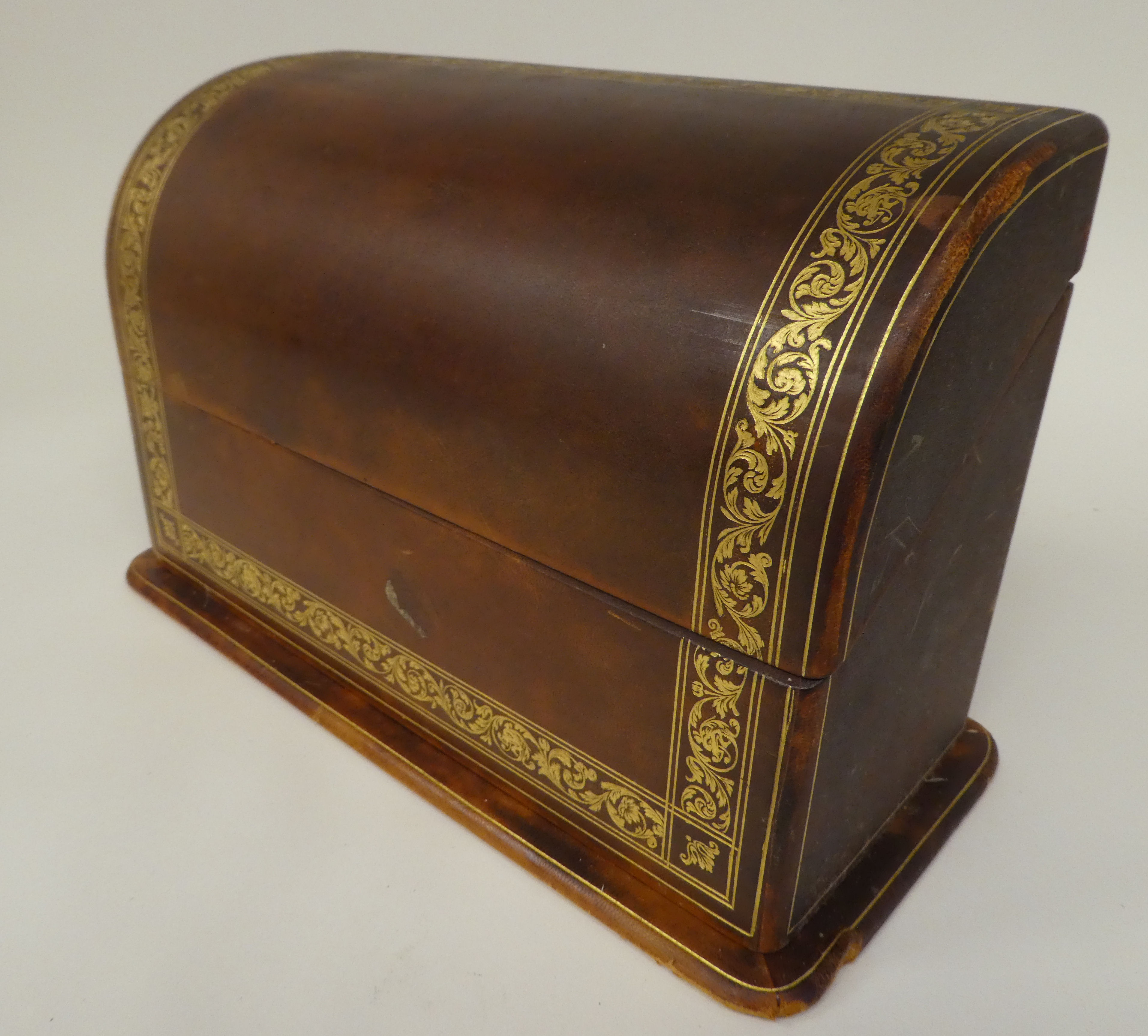 A Liberty gilded and burnished brown hide covered desk set, comprising a two-part blotter  19" x - Image 8 of 8