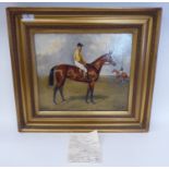 Alfred Wheeler - 'Flying Fox' an equestrian study with a mounted jockey  oil on canvas  bears an