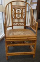 A late Victorian bamboo framed, round back Brighton Pavilion style chair with a woven, split cane
