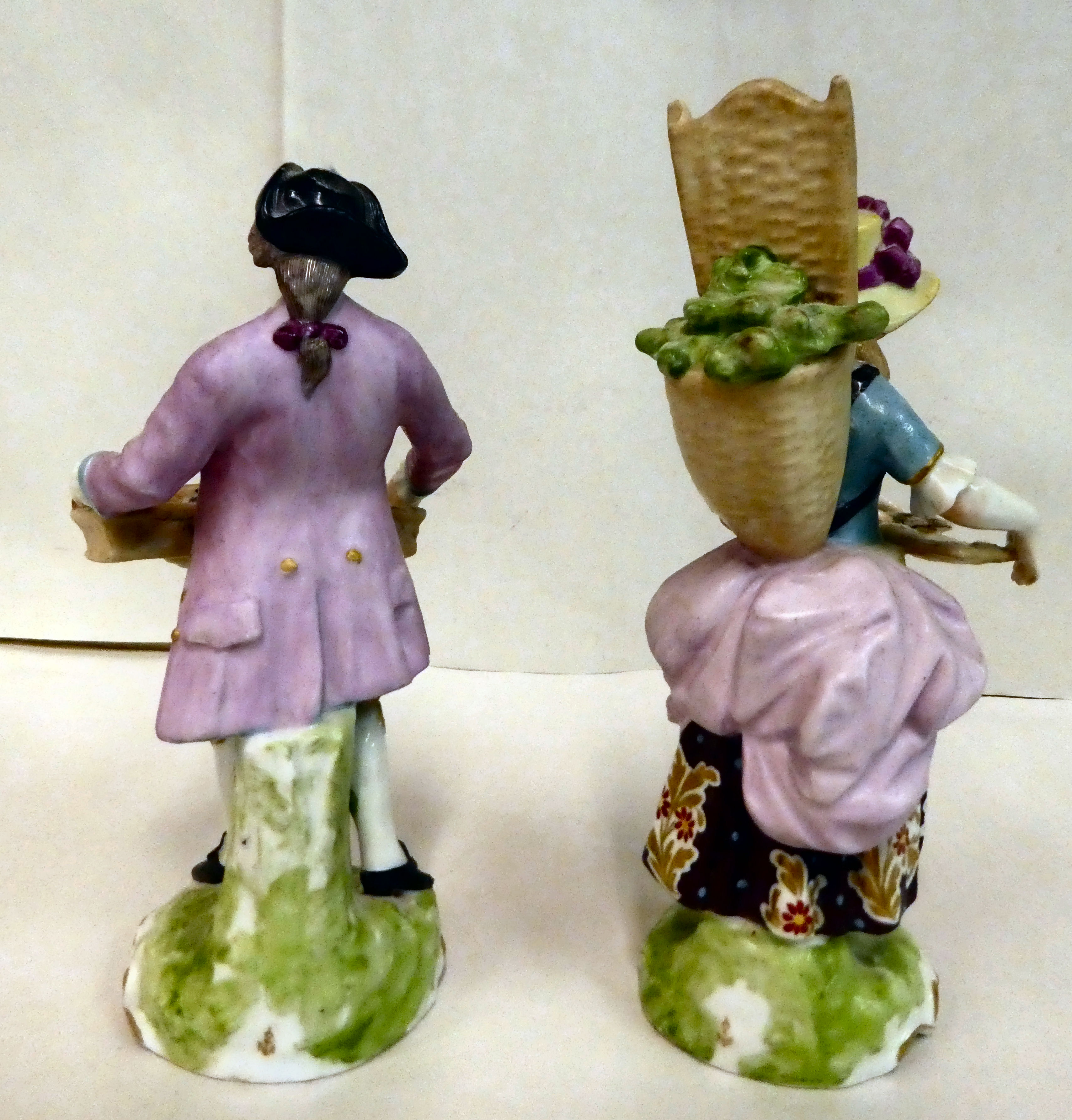 A pair of 20thC Continental porcelain figures, a man and a woman, street vendors  7.5" & 6.5"h - Image 2 of 3