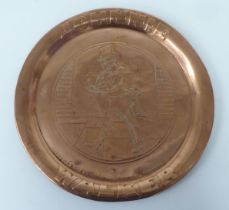 A John Walker & Sons 'Johnnie Walker' promotional copper tray  bears an impressed image of the