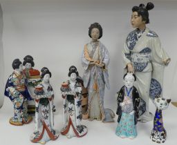 Modern Oriental ceramics: to include figures wearing traditional robes  largest 19"h