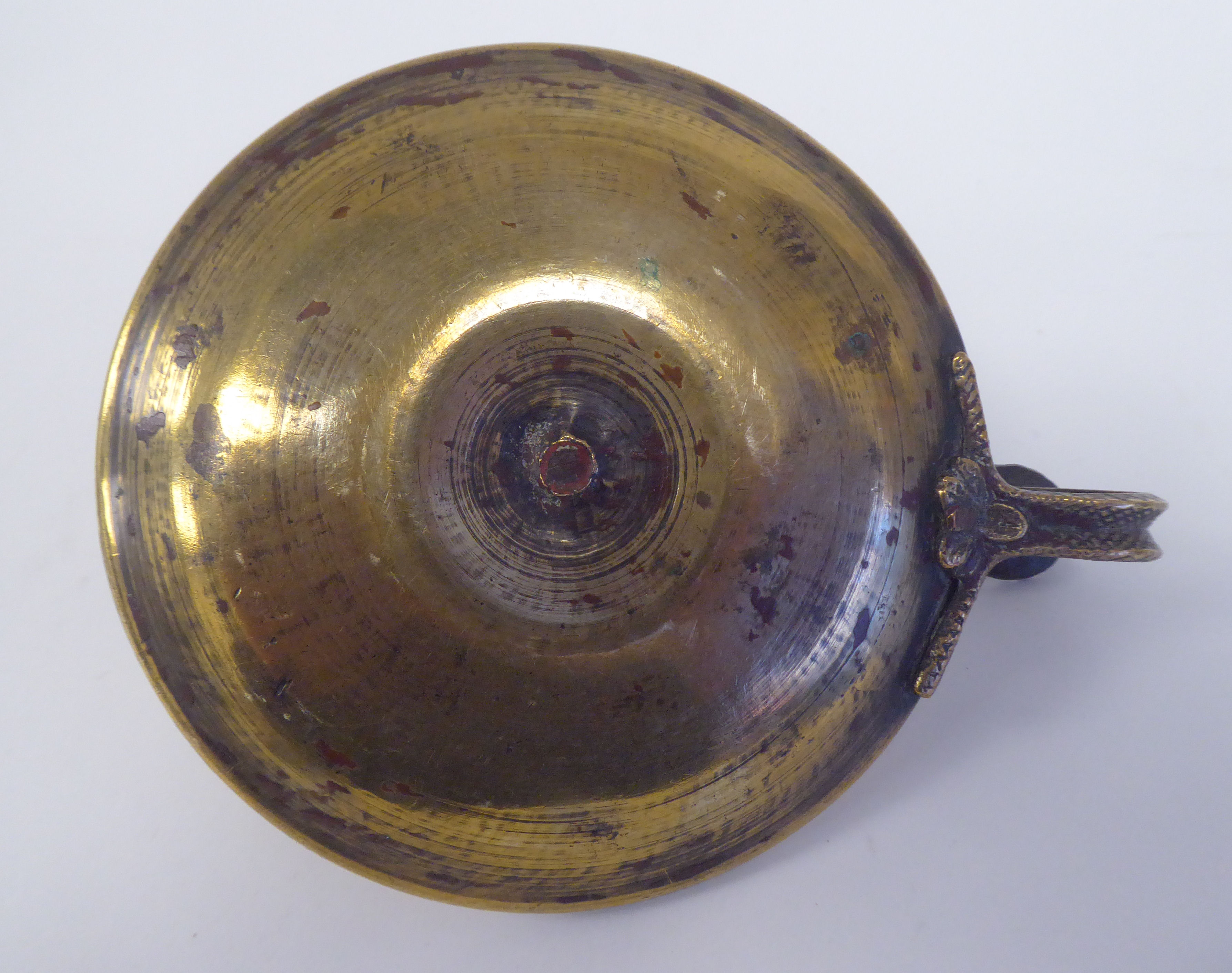 A Victorian brass chamberstick with a coiled snake handle and shell cast tab  bears a Queen Victoria - Image 5 of 5