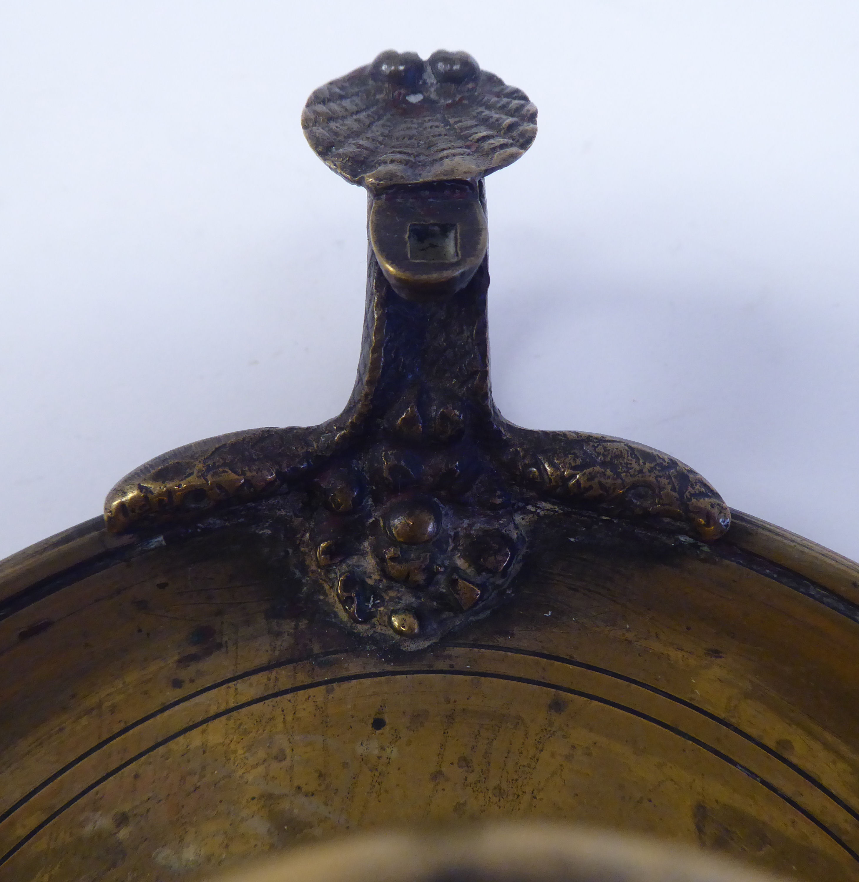 A Victorian brass chamberstick with a coiled snake handle and shell cast tab  bears a Queen Victoria - Image 4 of 5
