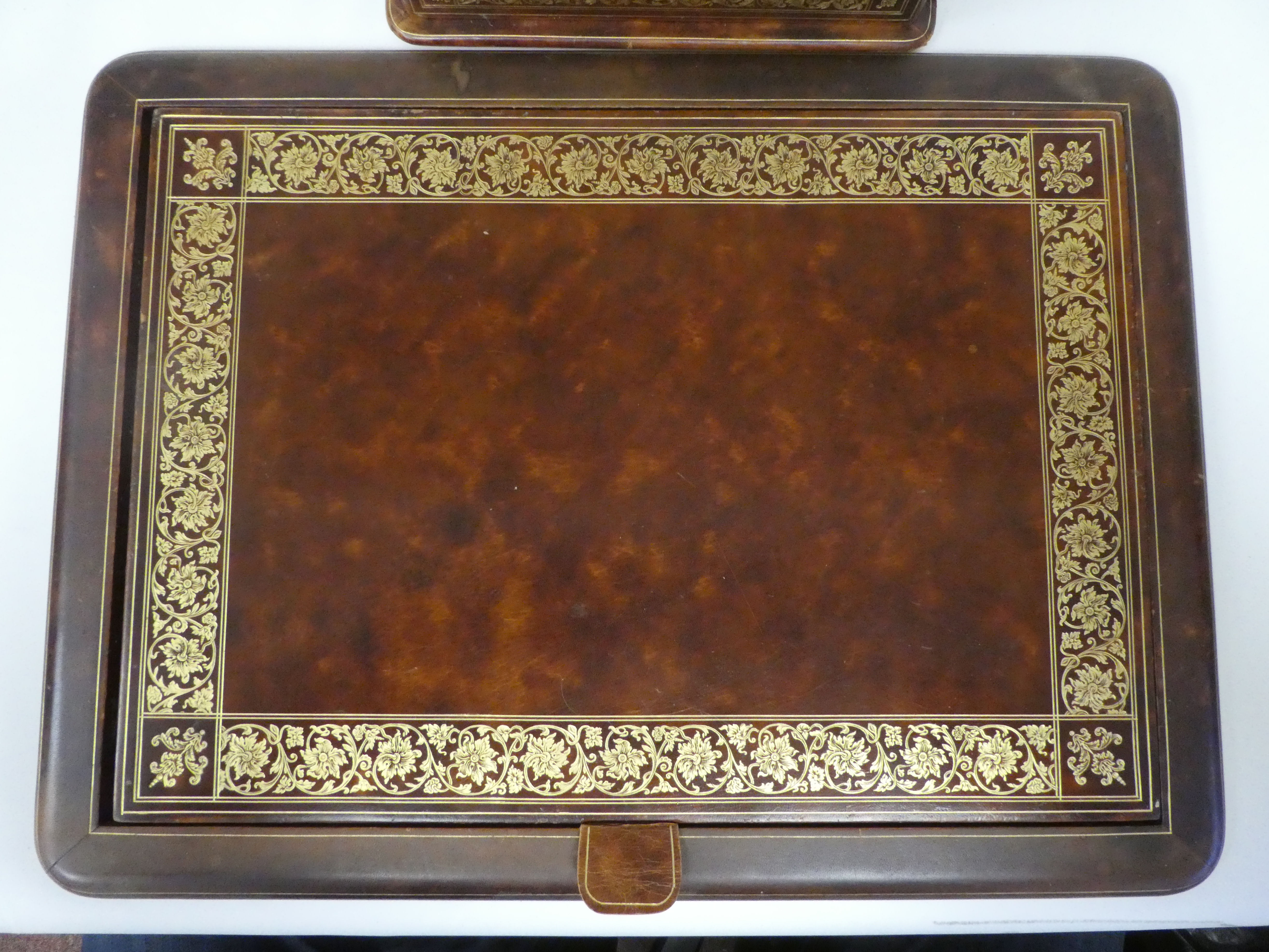 A Liberty gilded and burnished brown hide covered desk set, comprising a two-part blotter  19" x - Image 4 of 8