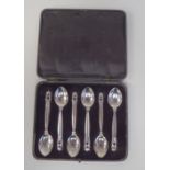 A set of six Georg Jensen silver teaspoons with scrolled terminals  stamped 925  cased