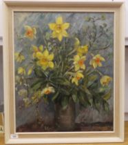 E Eardley - a still life study of daffodils in a vase  oil on board  bears a signature  19" x 23"