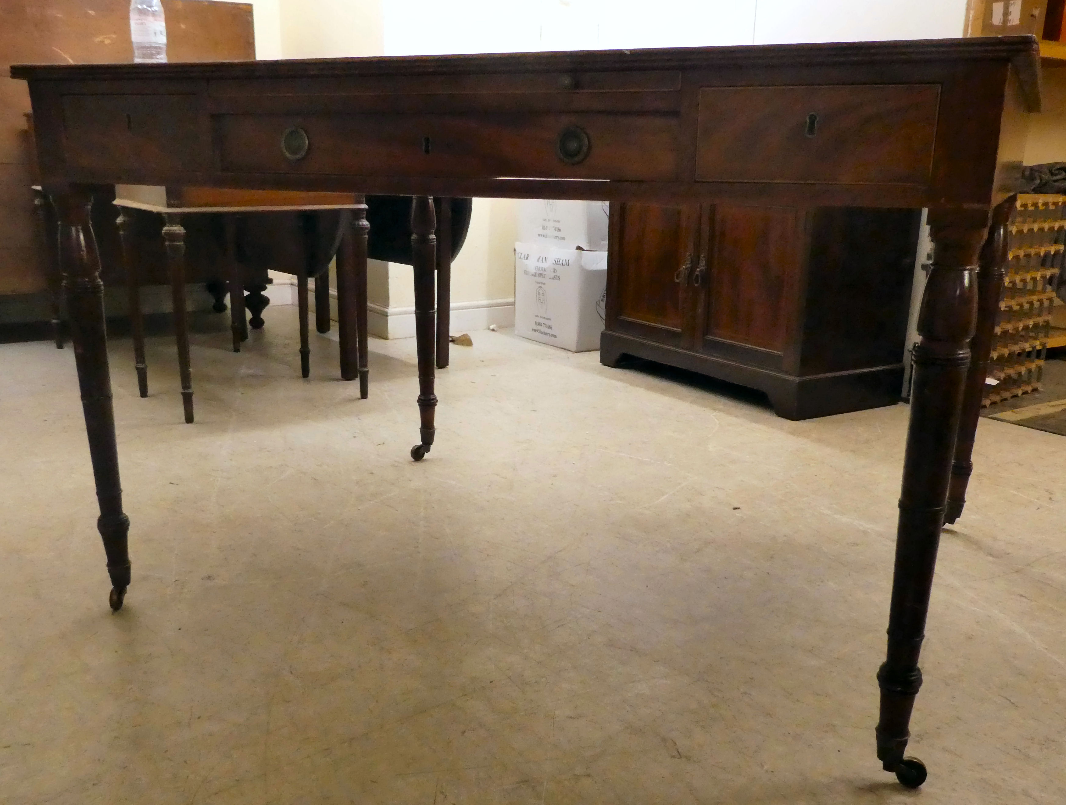 A late Victorian mahogany library table with a tooled and gilded hide scriber, over an arrangement - Image 5 of 9