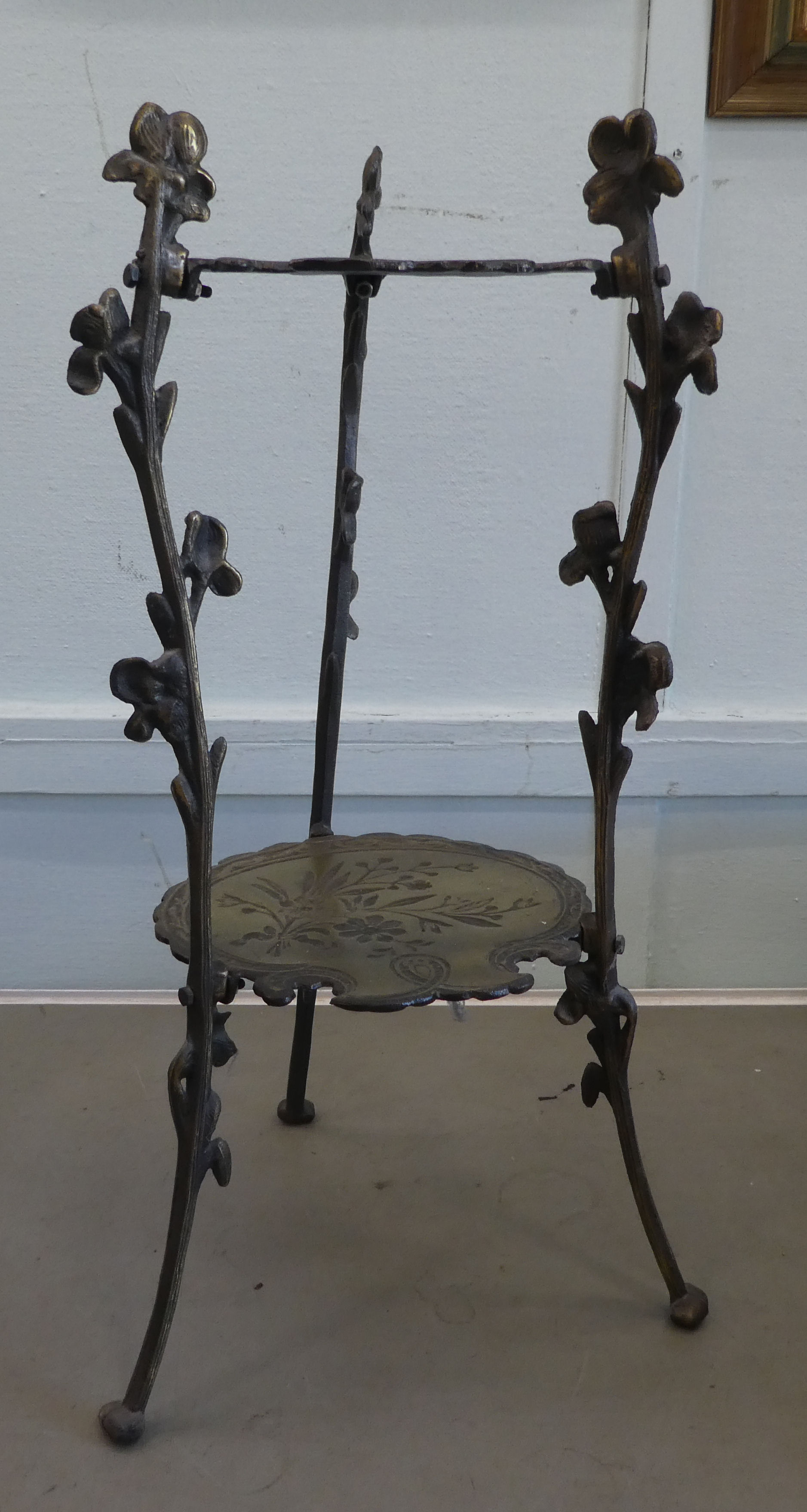 A modern cast iron and brass, two-tier cakestand  27"h